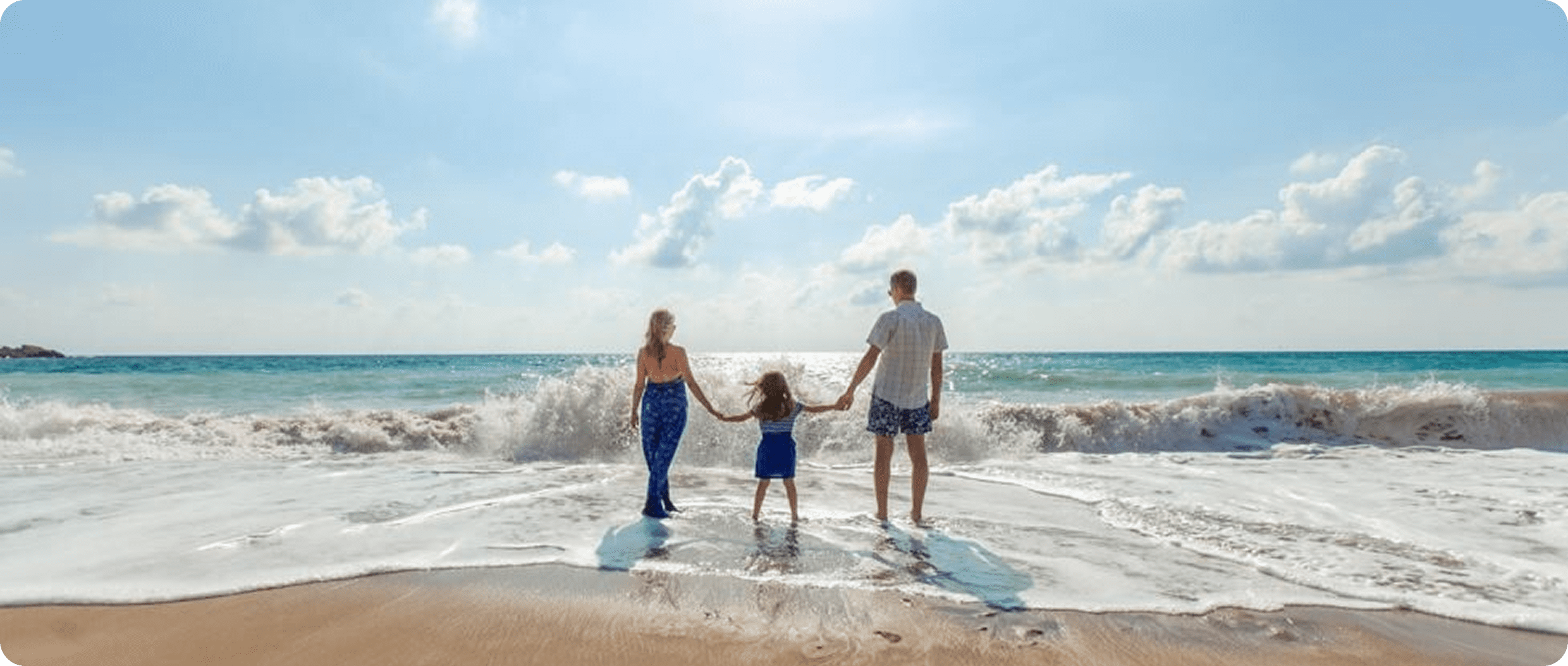 Seaside family fun under clear sky