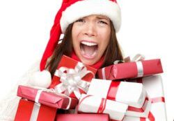 Excited woman with Christmas presents
