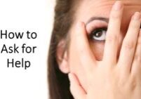 Woman peeking through fingers